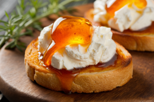 Crispy toast topped with creamy ricotta and drizzled with golden honey.